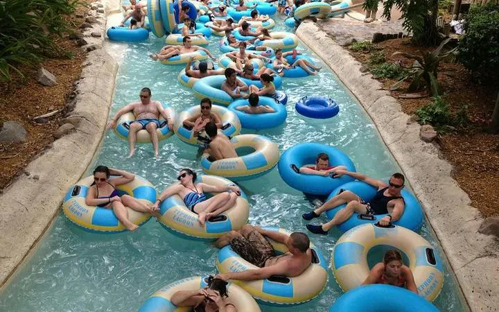 Visitors enjoying the lazy river at Splash Jungle Water Park, Phuket.