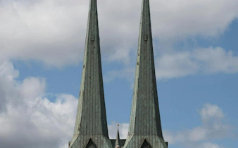 Twin spires of St. Nicholas Church in Berlin's Nikolaiviertel district.