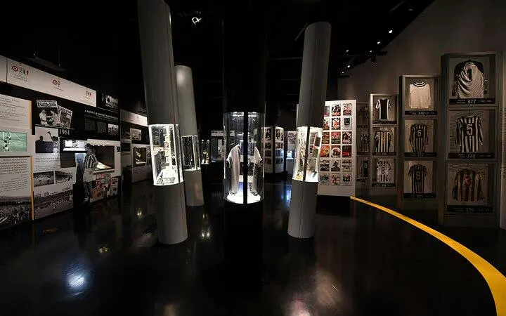 Juventus Museum exhibit with jerseys and memorabilia in Turin.