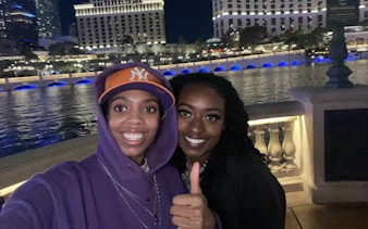 Visitors enjoying the Bellagio Fountains on the Las Vegas Strip during a self-guided city exploration game.