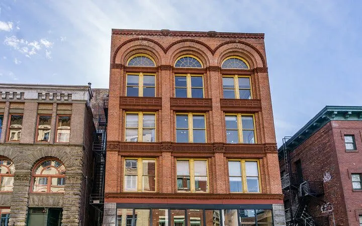 Seattle historic brick building on a self-guided Gold Rush city exploration game.