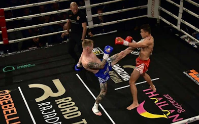 Muay Thai fighters in action at Rajadamnern Stadium, Bangkok.