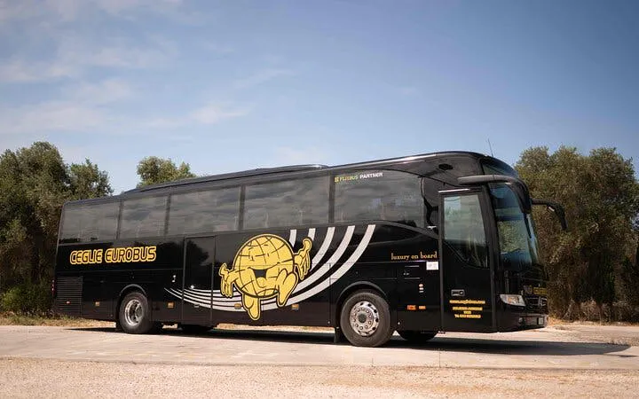 Tour bus for Valle d'Itria trip from Bari, featuring Polignano, Ostuni, Locorotondo.