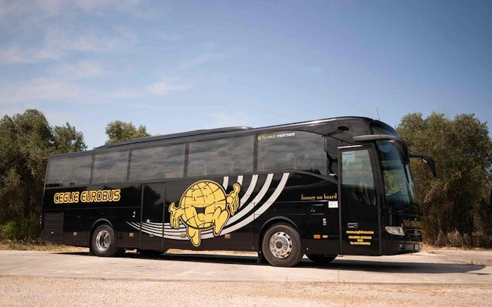 Tour bus for Valle d'Itria trip from Bari, featuring Polignano, Ostuni, Locorotondo.