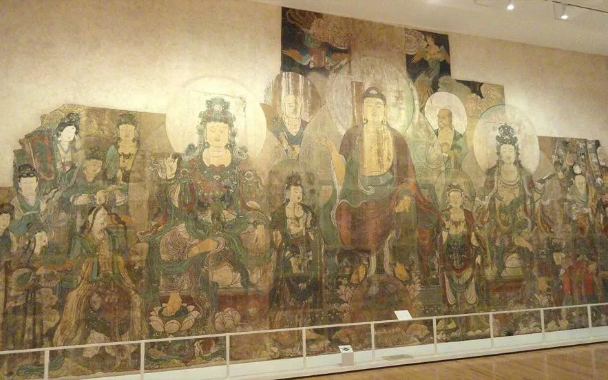 Ancient mural depicting Buddhist figures at Royal Ontario Museum, Toronto.