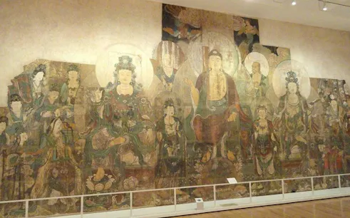 Ancient mural depicting Buddhist figures at Royal Ontario Museum, Toronto.