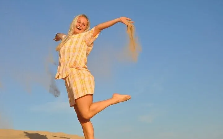 Person enjoying a desert safari at sunrise in Sharm El Sheikh.