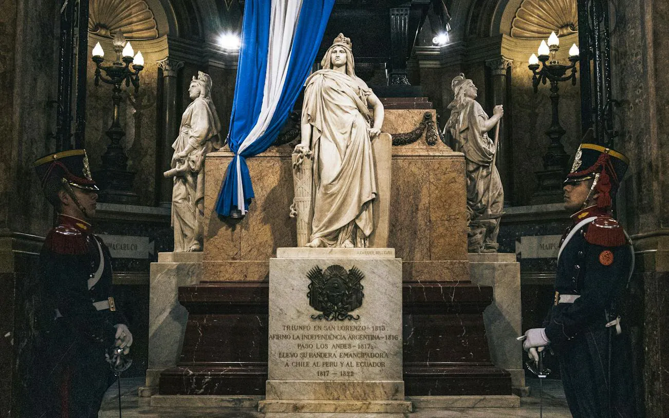 Statue of Liberty of Independence in Buenos Aires' Plaza de Mayo with ceremonial guards.