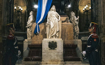Statue of Liberty of Independence in Buenos Aires' Plaza de Mayo with ceremonial guards.