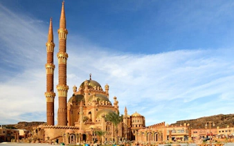 Mosque with tall minarets in Sharm El Sheikh during a private city tour.