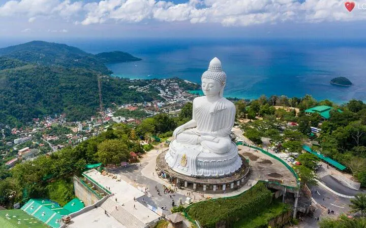 Big Buddha statue overlooking Phuket island and coastline on guided tour.