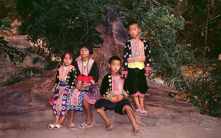 Children in traditional Hmong attire at a village near Doi Suthep Temple, Chiang Mai.