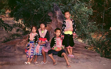 Children in traditional Hmong attire at a village near Doi Suthep Temple, Chiang Mai.