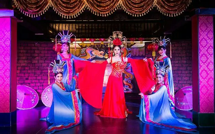 Performers in traditional costumes on stage at Blue Dragon Cabaret, Krabi.