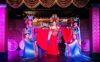 Performers in traditional costumes on stage at Blue Dragon Cabaret, Krabi.