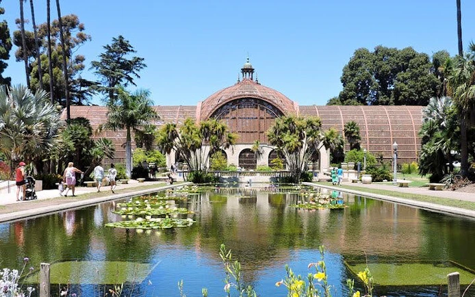 Balboa Park Botanical Building with lily pond in San Diego during self-guided city exploration game.