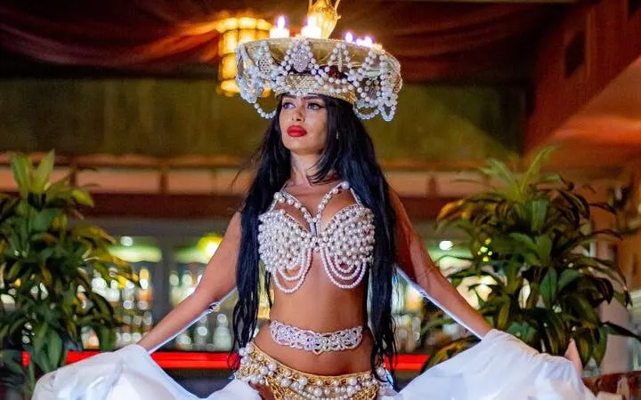 Performer in ornate costume at Amazing Nights Cabaret Show, Hurghada.