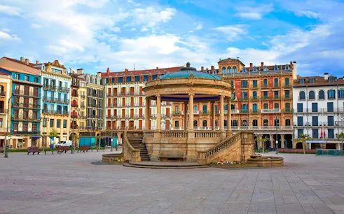 Plaza del Castillo with gazebo in Pamplona, featured on self-guided walking tour app.
