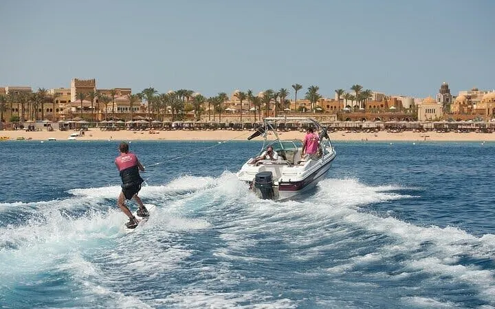 Water skiing behind a boat with glass viewing in Sharm El Sheikh, Egypt.