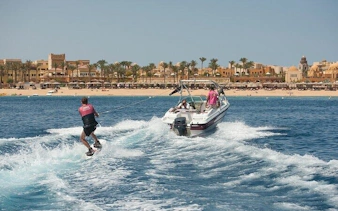 Water skiing behind a boat with glass viewing in Sharm El Sheikh, Egypt.
