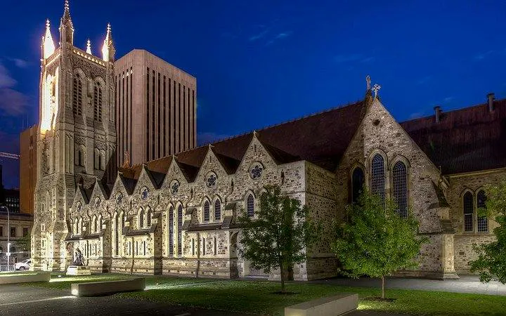 St Peter's Cathedral illuminated at night, part of Adelaide Self-Guided Audio Tour.