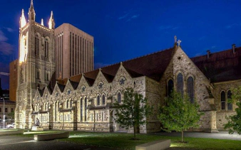 St Peter's Cathedral illuminated at night, part of Adelaide Self-Guided Audio Tour.