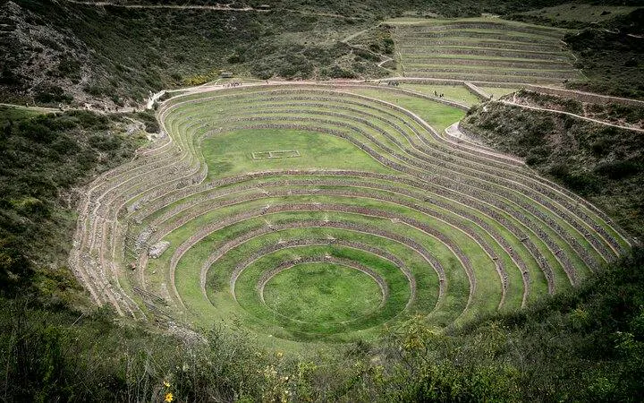 Terraced agricultural site in Moray, Sacred Valley, Peru, showcasing circular Inca ruins.