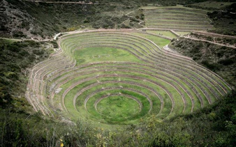 Terraced agricultural site in Moray, Sacred Valley, Peru, showcasing circular Inca ruins.
