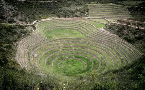 Terraced agricultural site in Moray, Sacred Valley, Peru, showcasing circular Inca ruins.