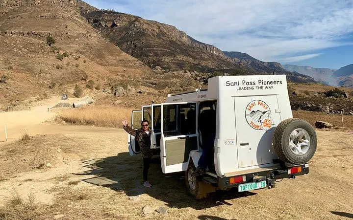 4x4 vehicle on Sani Pass tour from Durban to Lesotho with mountainous landscape.
