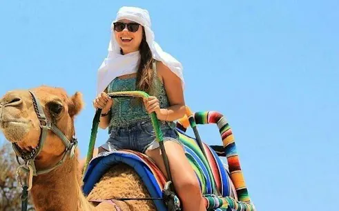 Camel ride experience in Marrakesh's Palm Grove Desert.