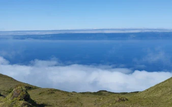 Pico Island highlands view with clouds and ocean in the Azores.