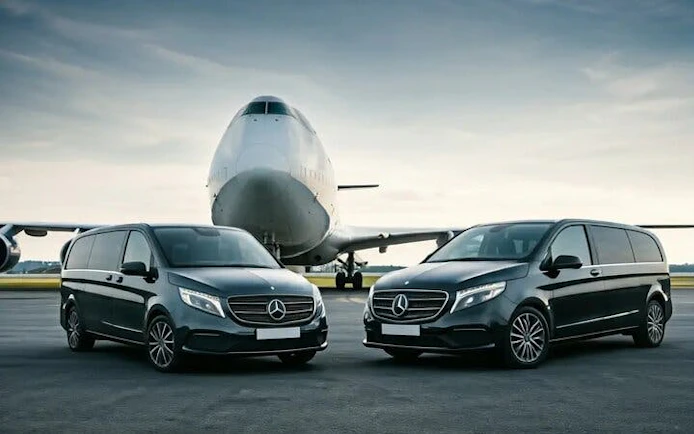 Mercedes vans at Antalya Airport for private transfer service.