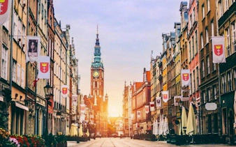 Long Market street with Gdansk Town Hall at sunset, part of Gdansk self-guided audio walking tour.