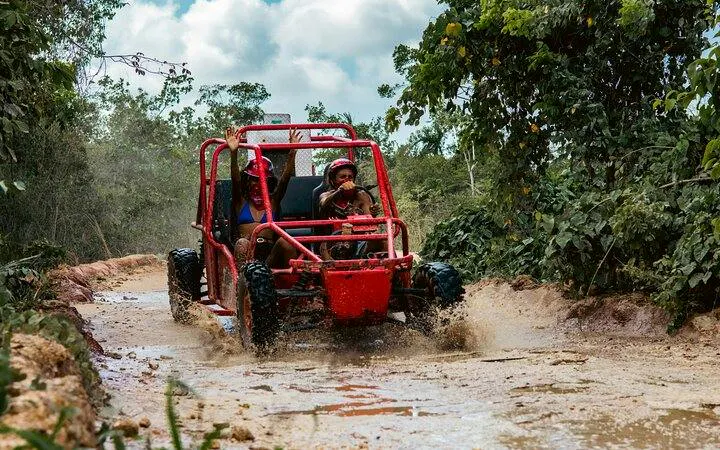Buggy ride through muddy trail at Taino Park, Punta Cana.