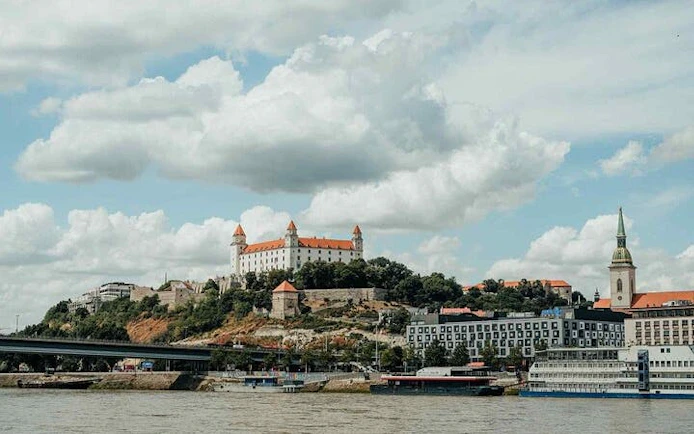 Bratislava Castle and St. Martin's Cathedral viewed from the Danube River.