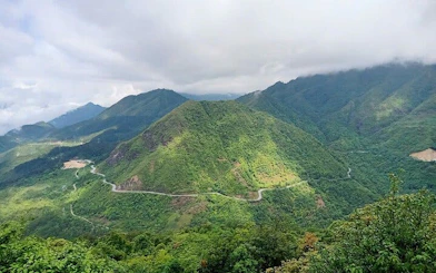 Sapa mountain landscape with winding road, Vietnam.