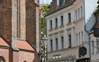 Historic buildings in Berlin's Nikolaiviertel district during a self-guided audio walk.