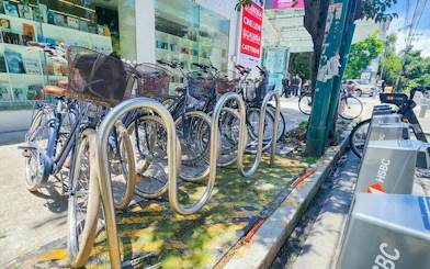 Bicycles parked at a rack in Mexico City, ready for a taco tasting tour.