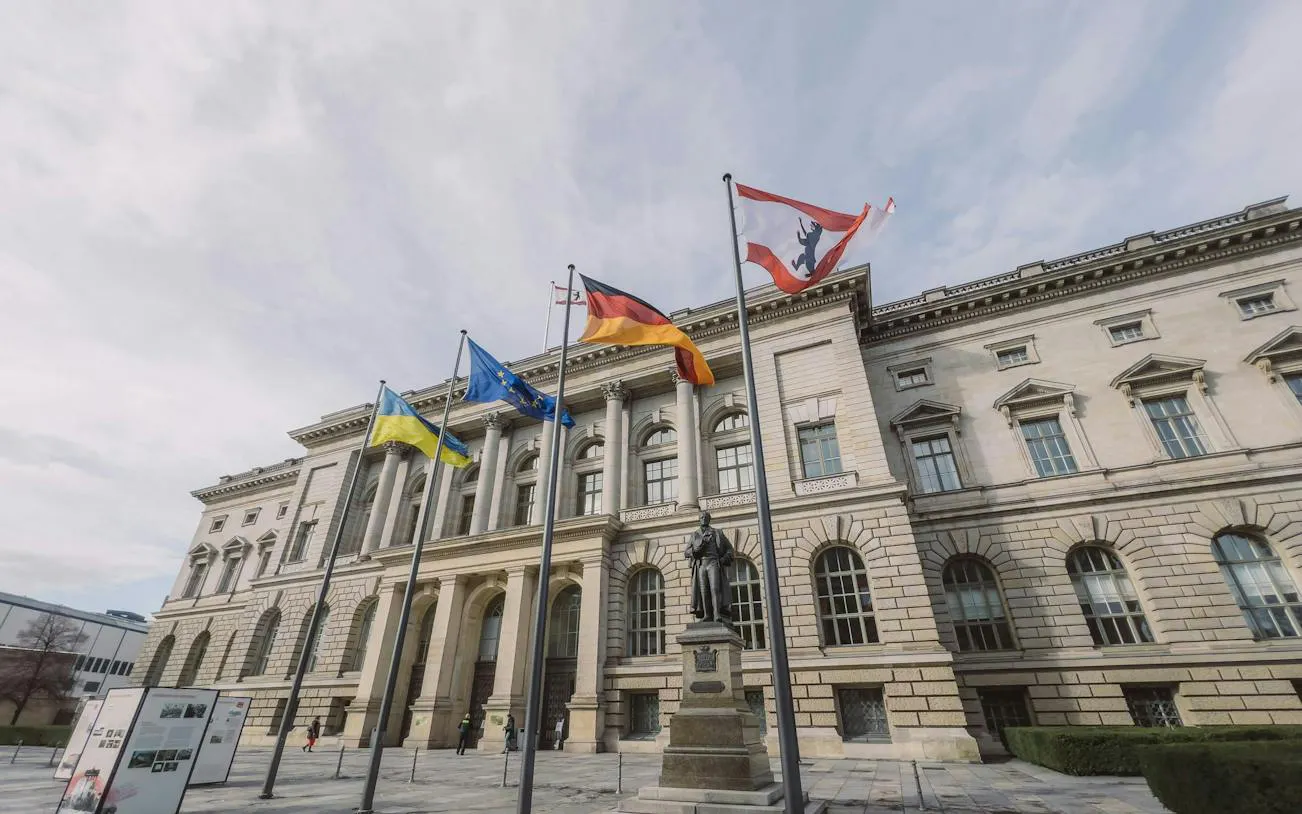 Flags outside the Berlin State Parliament building, part of the Checkpoint Charlie Self-Guided Audio Walk.