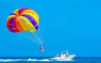 Parasailing over the Red Sea with colorful parachute, Sharm El Sheikh.