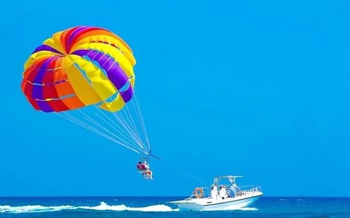Parasailing over the Red Sea with colorful parachute, Sharm El Sheikh.