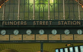 Flinders Street Station entrance with clocks, Melbourne Laneways and Arcades tour.