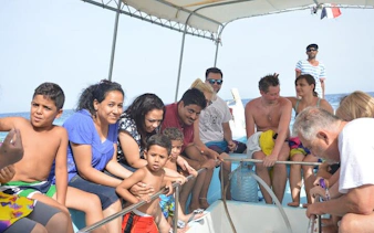 Group enjoying a glass boat trip in Sharm El Sheikh.