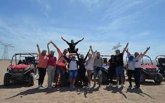 Group enjoying buggy car desert safari in Sharm El Sheikh's Echo Valley.