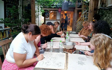 Participants creating batik art with beeswax at a Sa Pa H’Mong workshop.