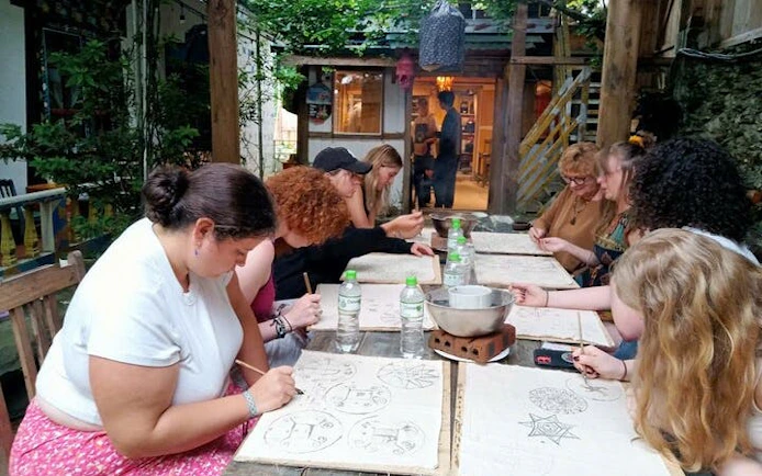 Participants creating batik art with beeswax at a Sa Pa H’Mong workshop.