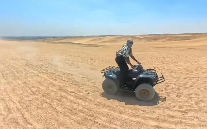 Giza Pyramids and Sphinx Guided Tour with Camel Ride, ATV Quad Bike, Lunch, and Hotel Transfers