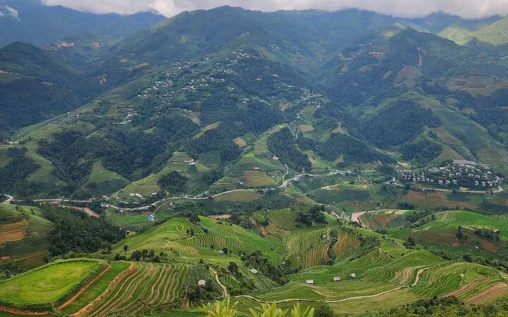 Terraced rice fields and mountains in Mu Cang Chai, Northern Vietnam, viewed during a motorbike tour to Sapa.