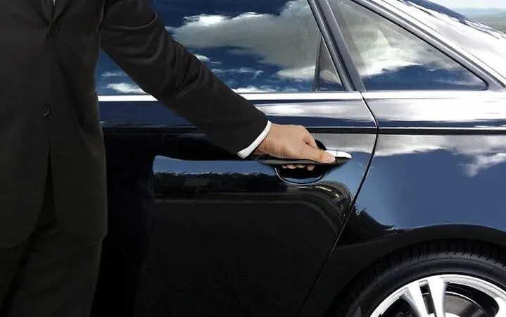Private car door being opened for Agadir to Marrakesh transfer.